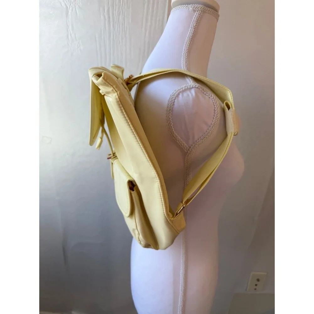 Year of Ours Nylon Backpack Pale Yellow Drawstring Buckle Flap OS NWT